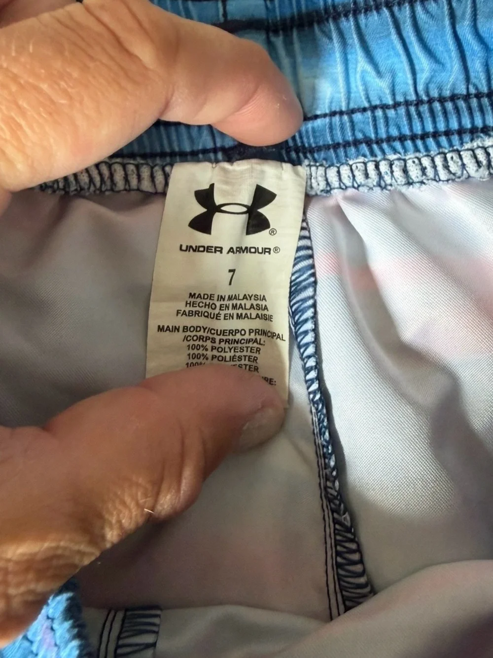 Under Armour boys Blue & Red swim trunks size 7